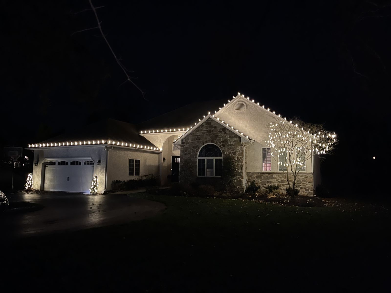 Professional Christmas lights on a ranch home