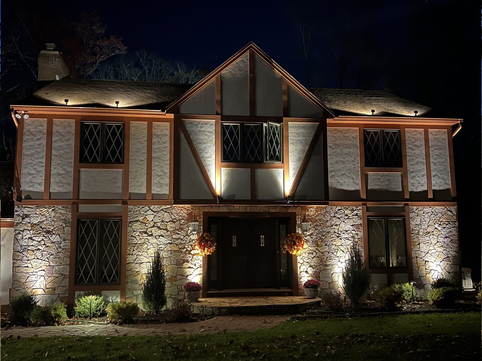 Landscape lighting on a ranch-style home